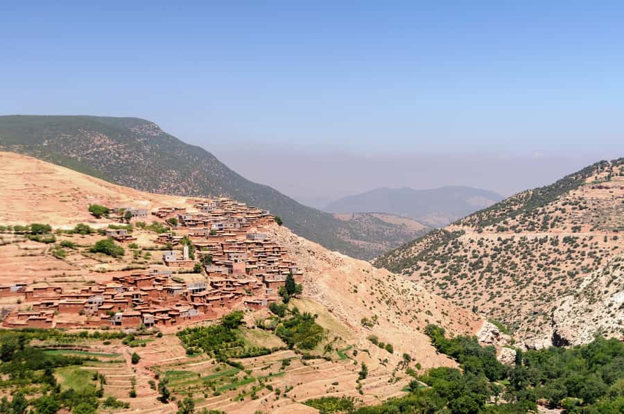 Marrakech: Atlas Mountains & Agafay Desert Tour w Camel Ride - Waterfalls, terraces, and changing mountain conditions