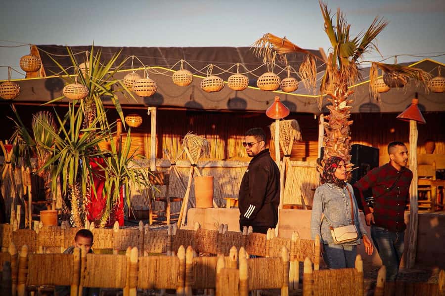 Marrakech: Camel Ride, Dinner, Pool, and Fire Show in Agafay - A short camel ride timed for sunset
