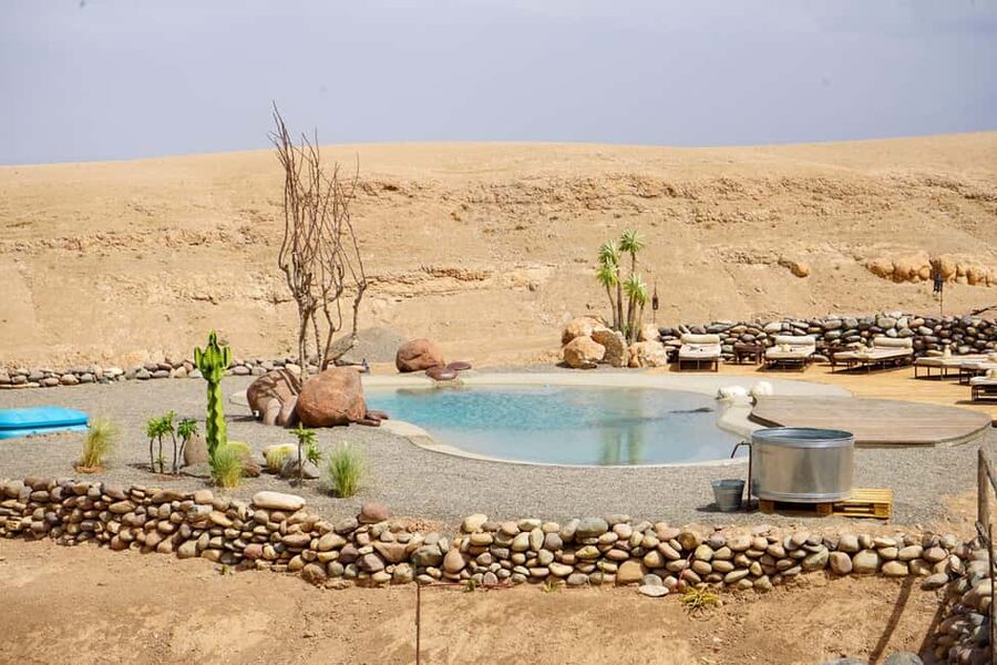 Marrakech: Day Pass in The Desert, swimming pool and lunch - Pool time, music, and camp atmosphere