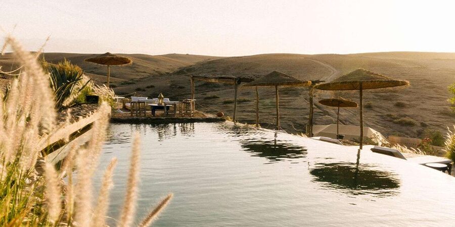 Marrakech: Day Pass in The Desert, swimming pool and lunch - Camel rides and other optional activities