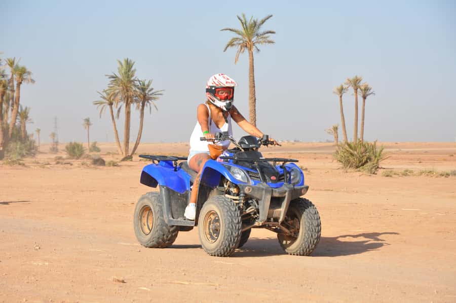 Marrakech: Desert and Palm Grove Quad Tour with Tea - Riding through the palm grove