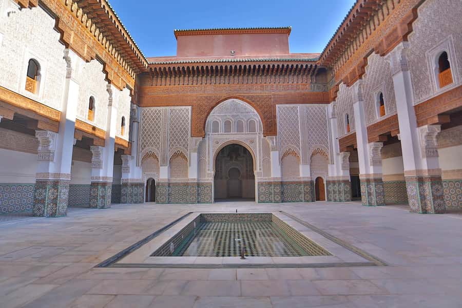 Marrakech: Madrasa Ben Youssef, Secret Garden & Medina Tour - Following craft lanes through the Medina
