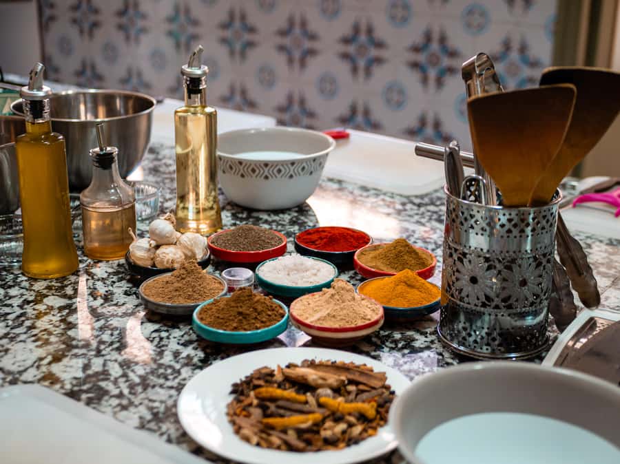 Marrakech: Moroccan Cooking Class with Market Visit and Meal - Preparing tajines, salads, and dessert