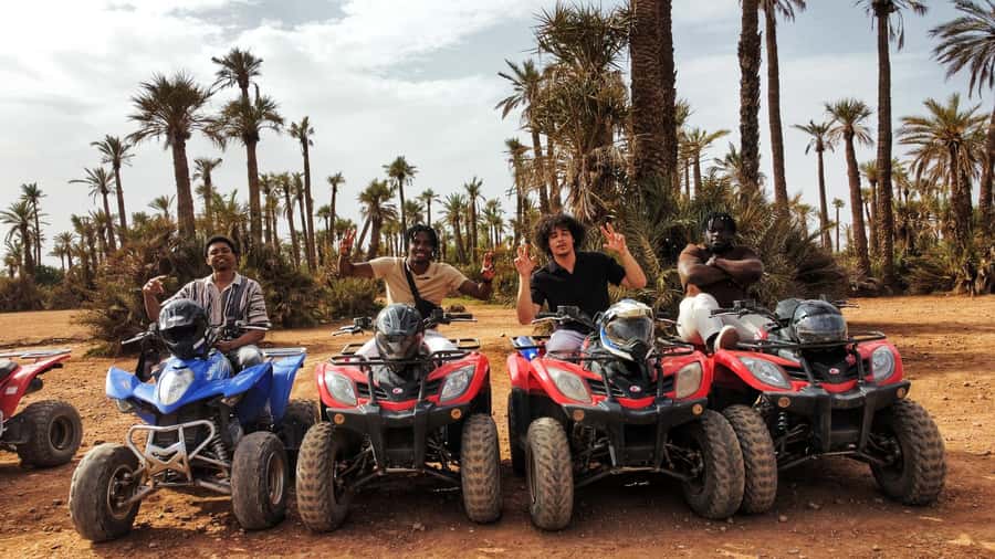 Marrakech: Palmeraie Guided Quad Biking Tour with Tea - Photo stop beside the palm trees