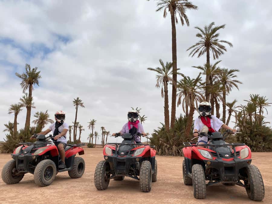 Marrakech: Quad Bike and Camel Ride Tour - Riding past palms, villages, and mountain views
