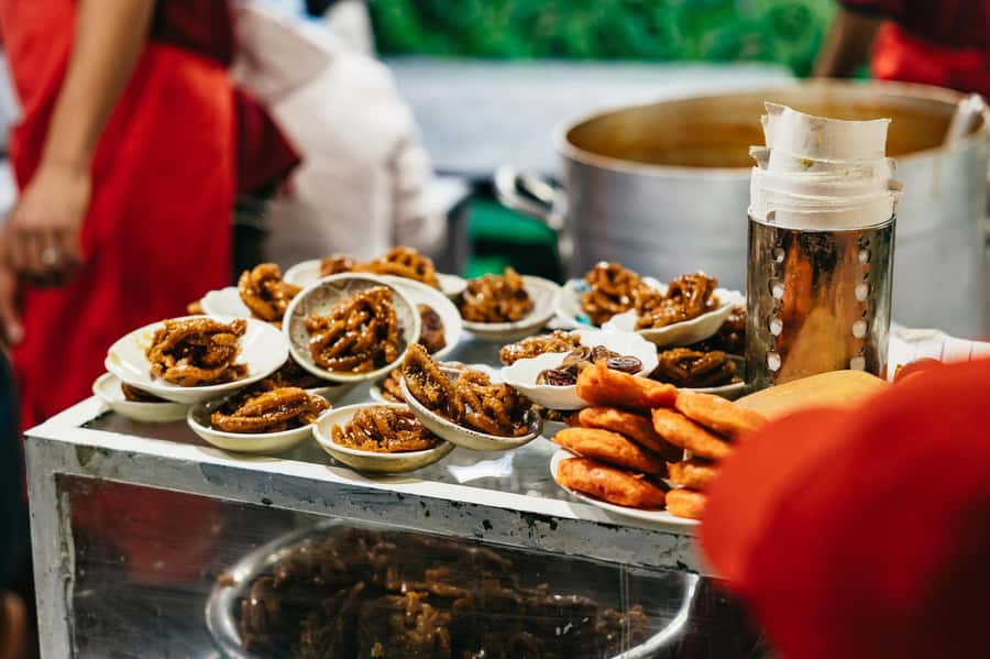 Marrakech: Street Food Tour by Night - Almond drink, sweets, and Moroccan food lessons