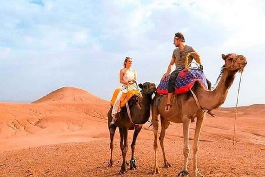 Marrakech: Sunset Dinner in Agafay Desert with Camel Ride - Sunset tea, sweets, and wide desert views