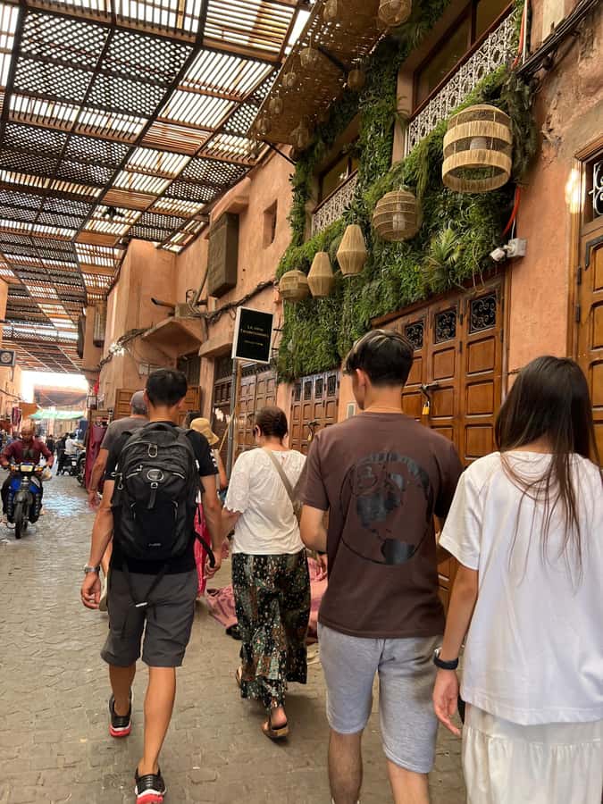 Marrakech: Traditional Moroccan Cooking Class & Market Visit - Cooking tagines, salads, and Moroccan dessert