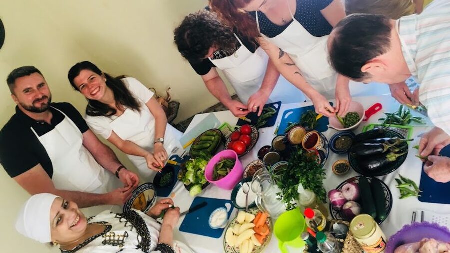 Marrakech: Traditional Moroccan Cooking Class & Market Visit - A warm riad setting with local women