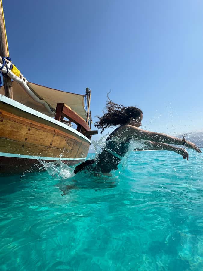 Matemwe: Mnemba Island Dolphin & Snorkeling Boat Trip - The boat ride toward Mnemba Island