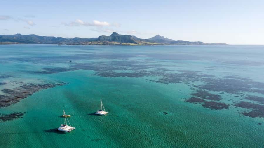 Mauritius: Ile aux Cerf Catamaran w/Waterfall Visit & Lunch - Swimming and snorkeling in the lagoon