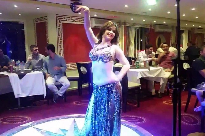 Nile Dinner Cruise in Cairo with Belly Dancing and Hotel Transfer - Belly dancing, Arabic music, and the Tanoura show