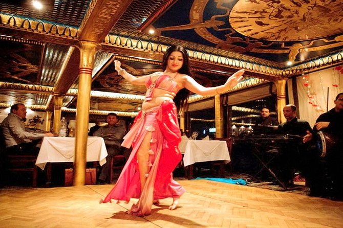 Nile Dinner Cruise in Cairo with Belly Dancing and Hotel Transfer - Boarding near Garden City and settling into the boat