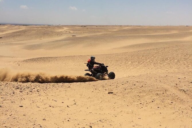 Quad Bike ATV Tours in Desert of Giza Pyramids with Egyptian Tea - Photographing the pyramids from the sand