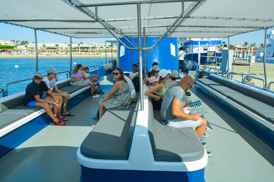 Safaga/Makadi Bay: Panorama Submarine with Snorkeling Tour - Boarding the boat and heading across Makadi Bay