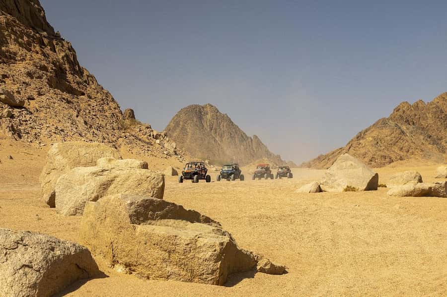 Sharm El Sheikh: Quad Biking & Desert Safari with Pickup - Riding through the desert near Sharm El Sheikh