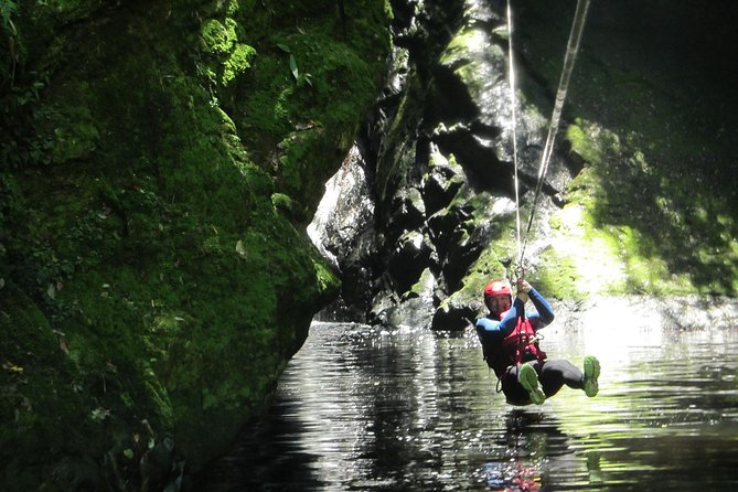 Standard Canyoning Trip in The Crags, South Africa - Rappelling down the 25-meter waterfall