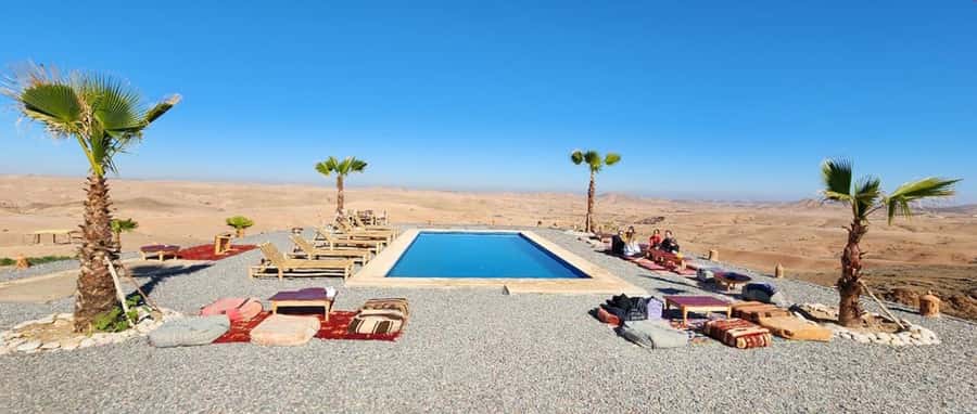Sunset Camel Ride in Agafay Desert with dinner and pool - Meeting the camels and starting the one-hour ride