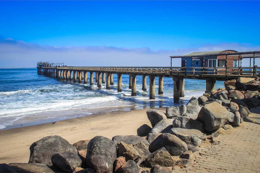 Walvis Bay and Sandwich Harbour Tour - Bright salt ponds and the coastal road