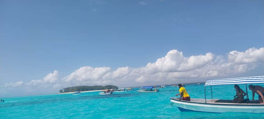 Zanzibar: Mnemba Island Dolphin and Snorkeling Tour - Lunch and the ride back to Zanzibar