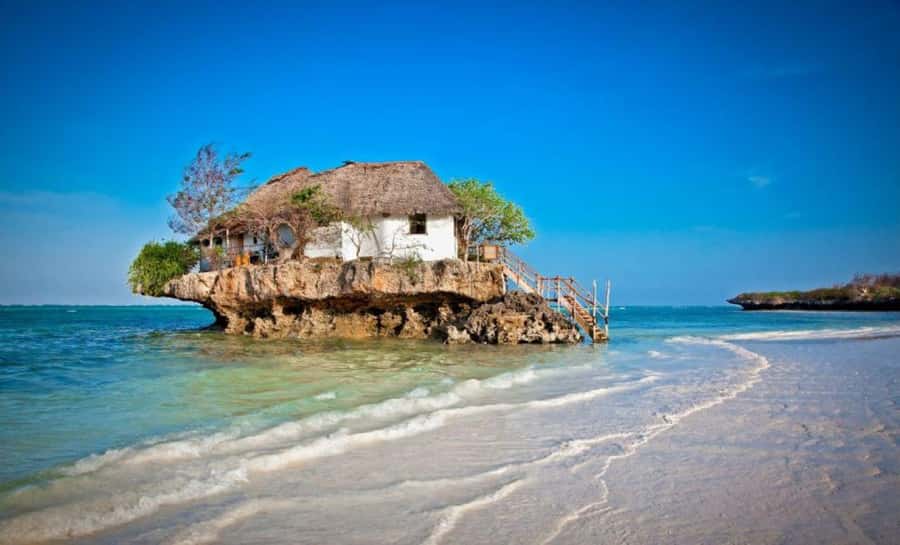 Zanzibar: Mnemba Island, Prison Island and Salaam Cave Tour - The Rock offers one of Zanzibar’s best photo stops