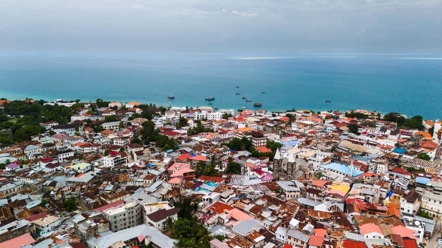 Zanzibar: Stone Town Historical Cultural Walking Guided Tour - Starting the day: pickup, timing, and pace